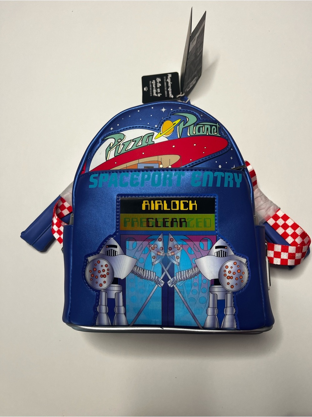 Pizza Planet Spaceport Entry Blue Mini Backpack by Disney Pixar